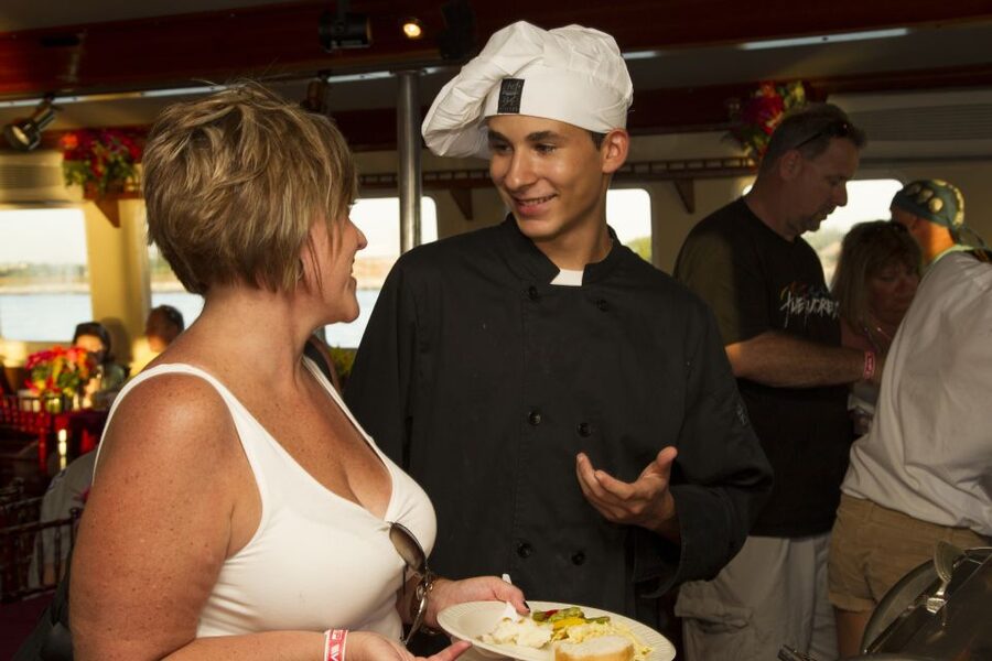 Key West: Sunset Dinner Cruise with Open Bar & Live Music - Stepping Aboard the Party Cat for a Classic Key West Sunset