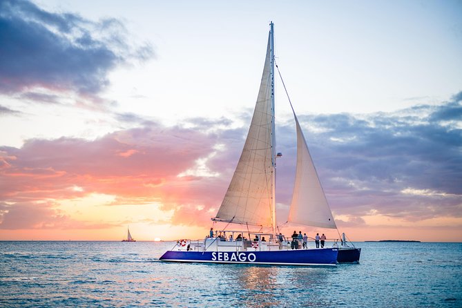 Key West Sunset Sail: Dolphin Watching, Wine, and Tapas - Getting On Board: Historic Seaport Start, What to Bring, and Simple Comforts