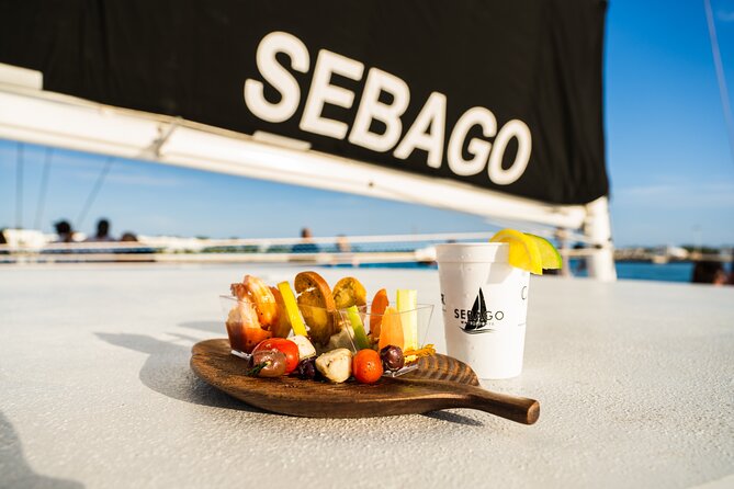 Key West Sunset Sail with Open Bar, Live Music and Hors D'oeuvres - Sailing Past Key West Landmarks on a Big Catamaran