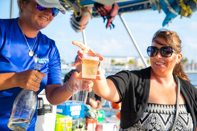 Key West Sushi Sunset Cruise with Complementary Drinks - First Stop Views: Schooners and Mega-Yachts in the Largest Harbor