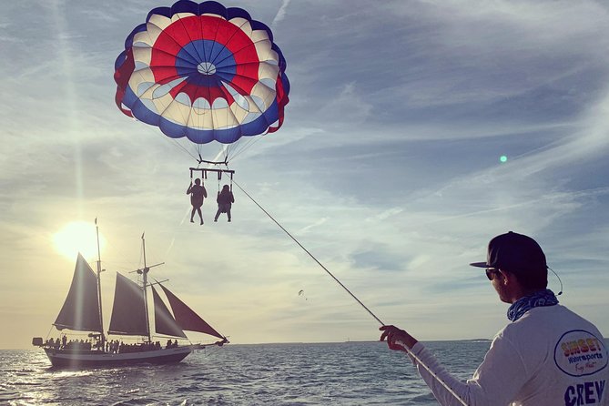 Parasailing in Key West at Smathers Beach - Stop 3: Florida Keys National Marine Sanctuary skies